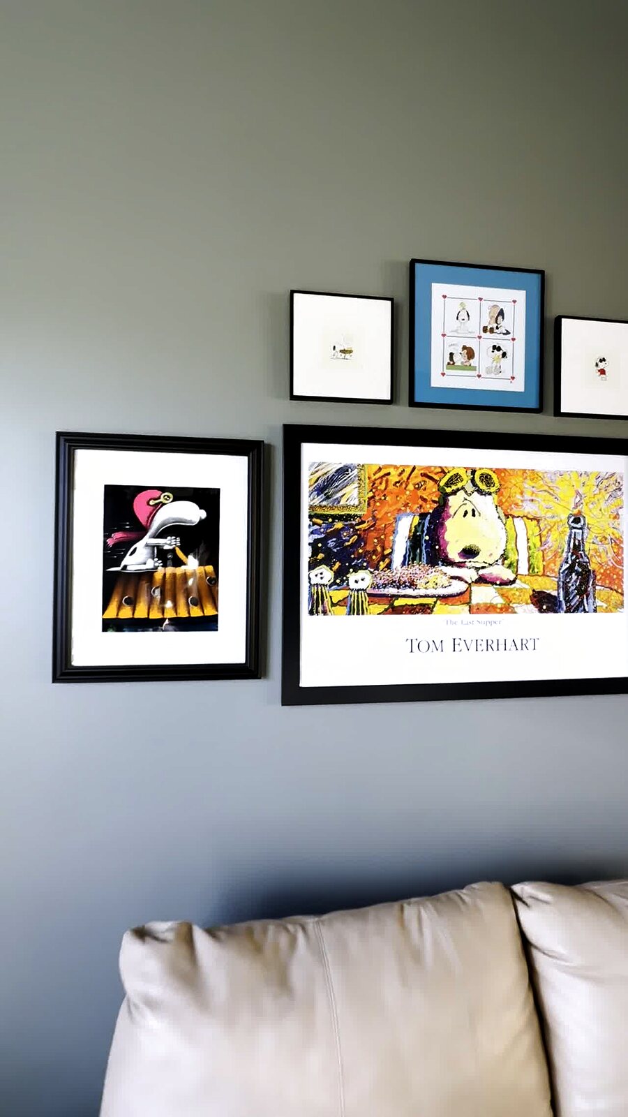 Gallery walls built around every piece of the collection — a room that is unmistakably someone’s.